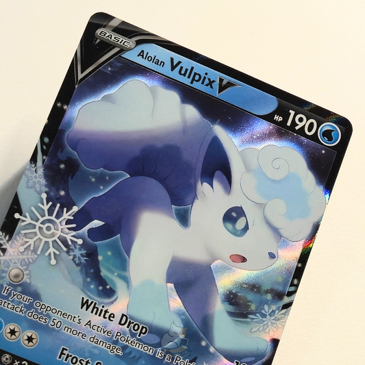Alolan Vulpix 033/195 V Ultra Rare Pokémon card from Silver Tempest – Near Mint condition – close-up detail