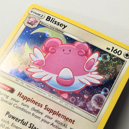 Blissey 153/214 Holo Rare Pokémon card from Lost Thunder – Near Mint condition – close-up detail