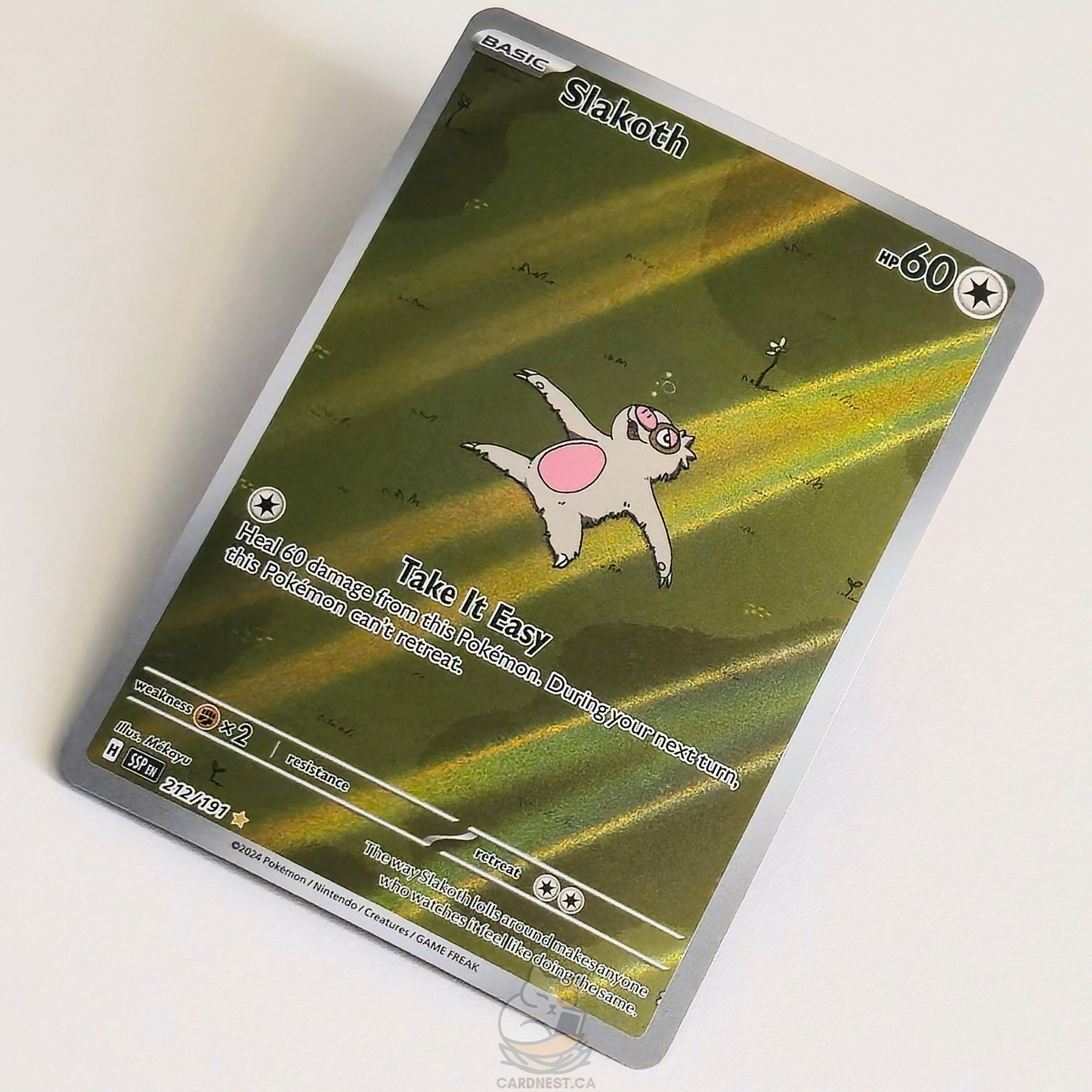 Slakoth 212/191 Full Art Illustration Rare Pokémon card from Surging Sparks – Near Mint condition – angled view